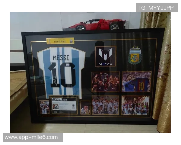 安哥拉队长赛后自豪展示与梅西交换的签名球衣将永久珍藏